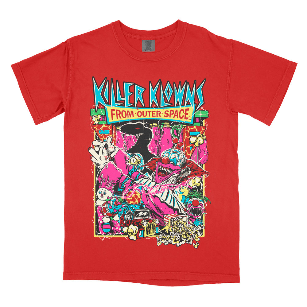 Officially licensed Killer Klowns From Outer Space Admission Is Free red Comfort Colors t-shirt featuring vibrant carnival-inspired artwork of the Killer Klowns, deadly popcorn, and the classic horror movie logo.