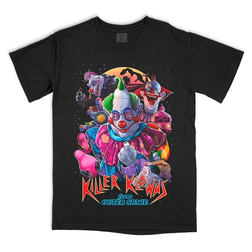 Officially licensed Killer Klowns From Outer Space Big Top Boys Comfort Colors t-shirt featuring a vibrant, oversized graphic of the Killer Klowns surrounded by creepy carnival imagery and the classic movie logo.