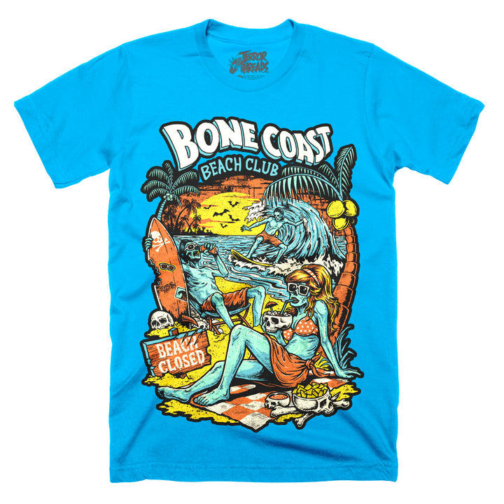 Bone Coast Beach Club electric blue Classic Terror Threads t-shirt featuring skeleton beachgoers, a surfer, palm trees, skulls, waves, and a beach closed sign in a retro tropical horror design.