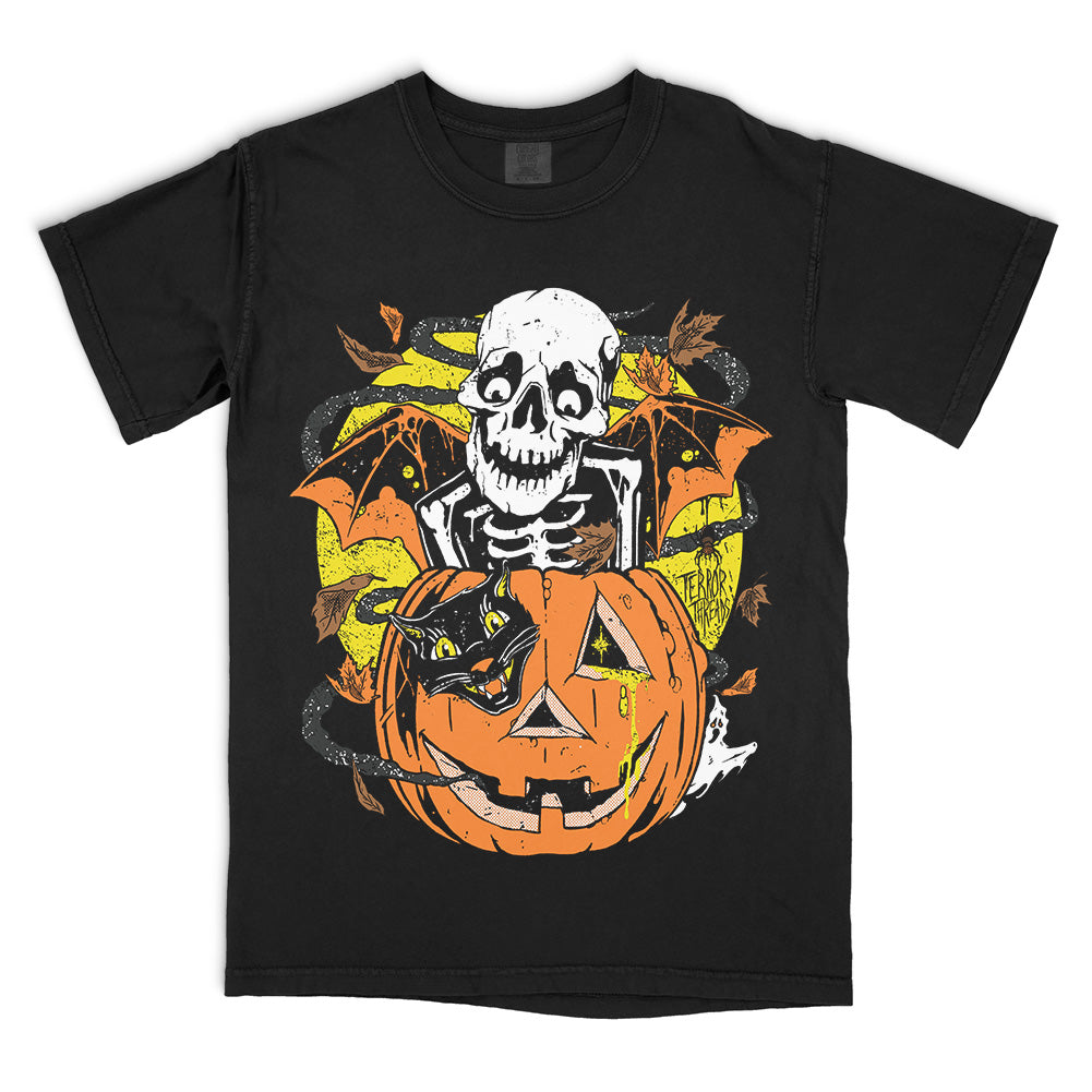 Terror Threads Bones O Lantern T-Shirt on a black Comfort Colors Tee featuring a skeleton, jack-o’-lantern, black cat, bats and ghosts in a vintage Halloween design