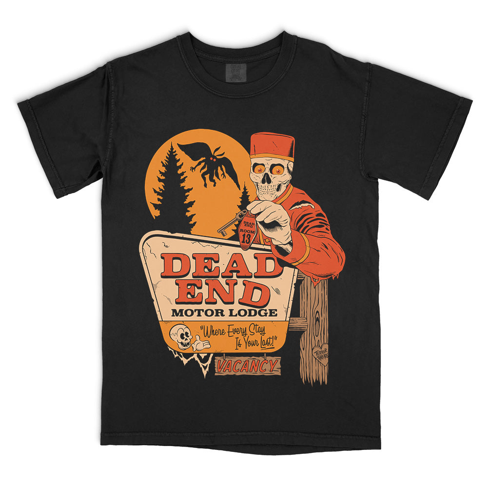 Dead End Motor Lodge original horror graphic Comfort Colors T-shirt in black featuring a skeletal bellhop, vintage motel sign, orange moon and winged creature
