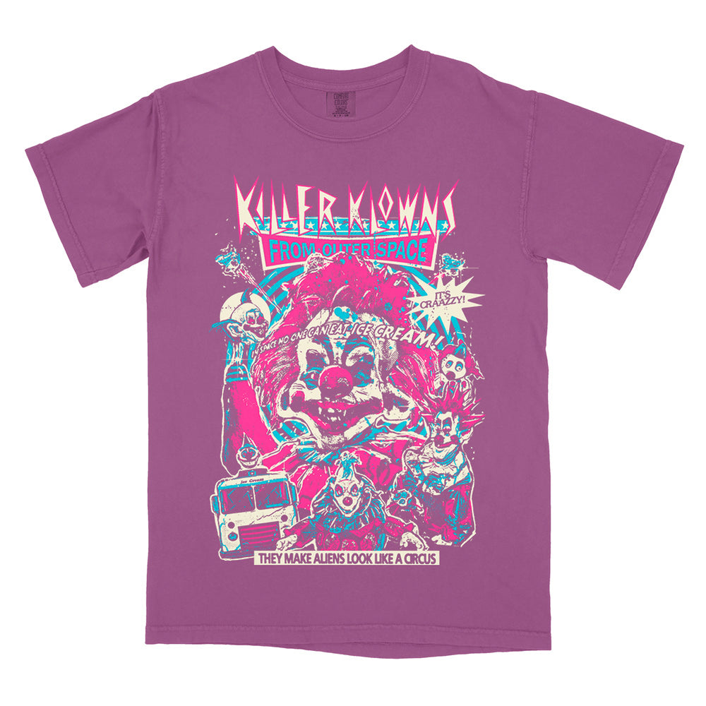 Officially licensed Killer Klowns From Outer Space Like A Circus Comfort Colors purple t-shirt featuring colorful retro-style artwork of the Killer Klowns, their sinister circus, and the classic movie tagline.