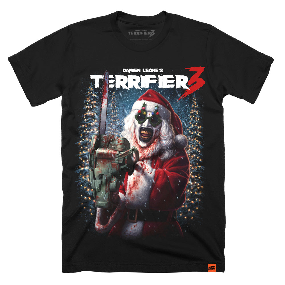 Terrifier 3 Merry Mayhem T-Shirt featuring Art the Clown dressed as Santa wielding a blood-soaked chainsaw amid glowing Christmas lights and snowy holiday horror imagery