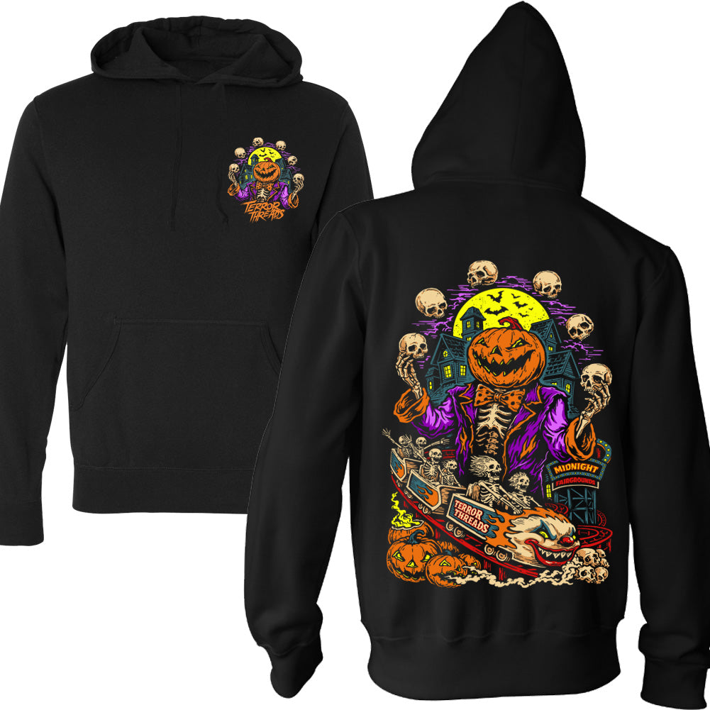 Terror Threads Midnight Fairgrounds black pullover hoodie with a small pumpkin-headed skeleton chest graphic on the front and a large haunted carnival design with skeletons, jack-o’-lanterns, skulls and a spooky full moon on the back.