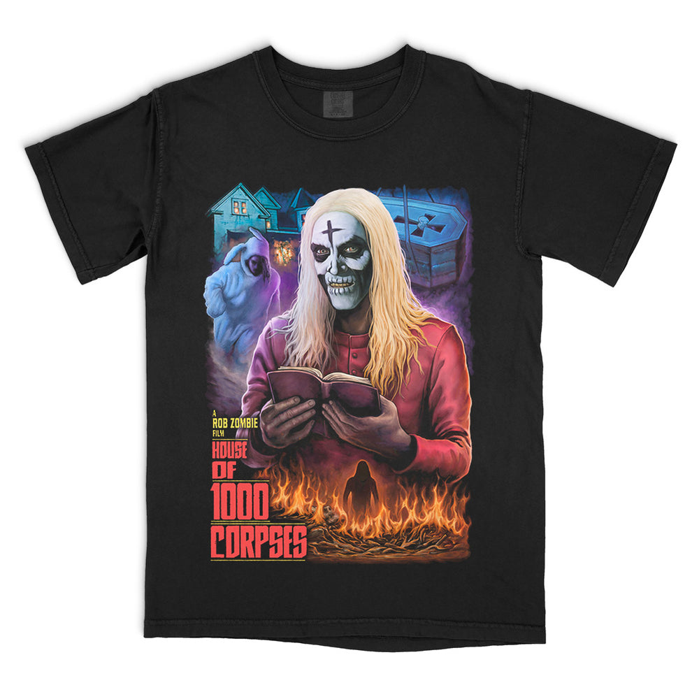 House of 1000 Corpses No Funny Books T-Shirt on a black Comfort Colors Tee featuring Otis Driftwood reading beside the Firefly house, Tiny and a burning ritual scene