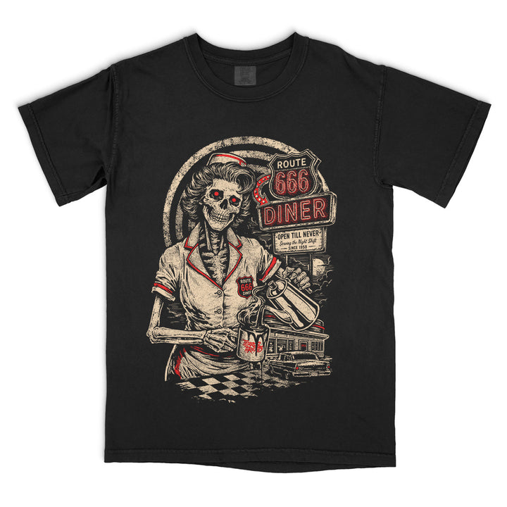 Route 666 Diner black Comfort Colors t-shirt featuring a skeletal waitress pouring coffee in front of a vintage roadside diner sign with retro horror artwork.