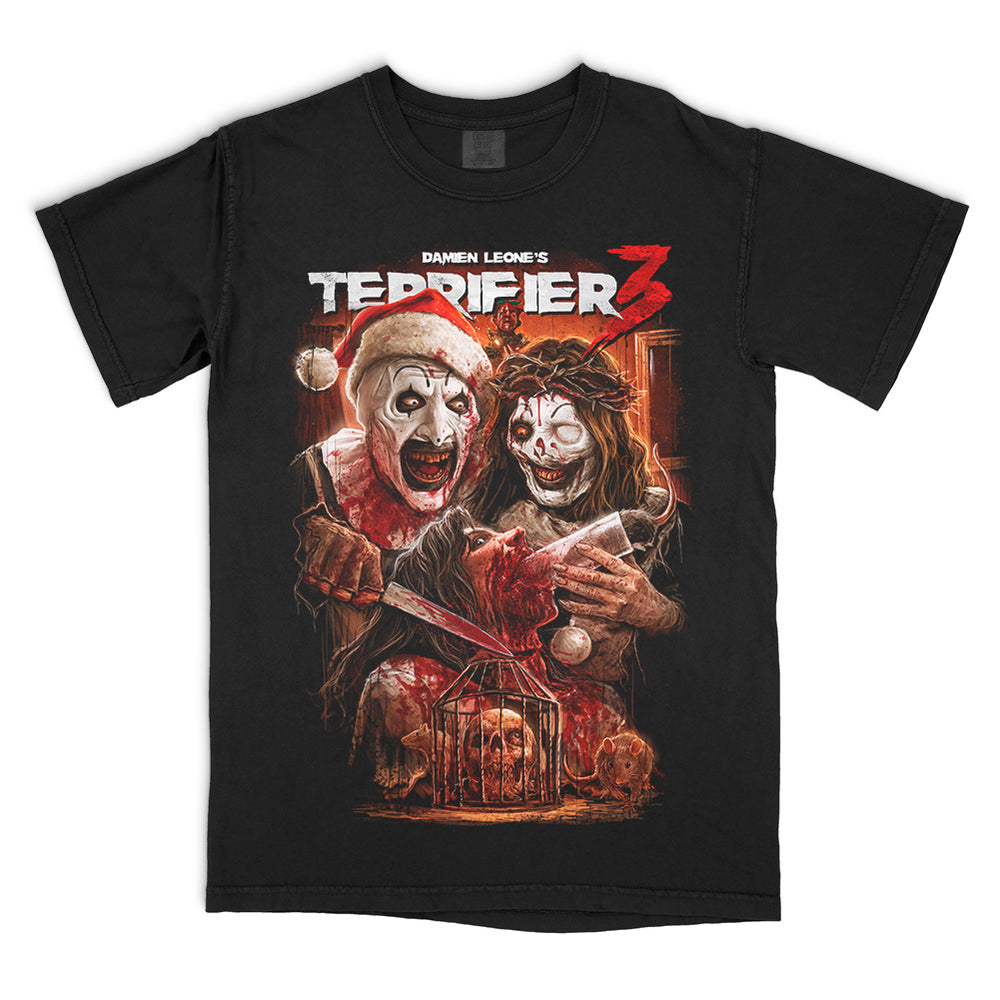 Terrifier 3 Saint Sicko T-Shirt on a black Comfort Colors Tee featuring Art the Clown in a Santa suit, Victoria Heyes and a blood-soaked holiday horror scene