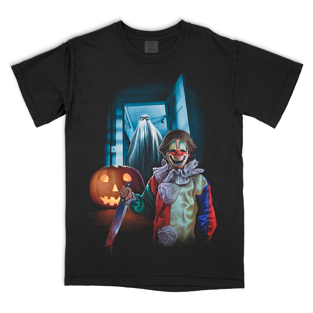 Halloween “Sleep Tight” T-Shirt showcasing a creepy clown with knife, illuminated pumpkin, and shadowy ghost in a dark hallway scene, printed on a black Comfort Colors relaxed fit tee.