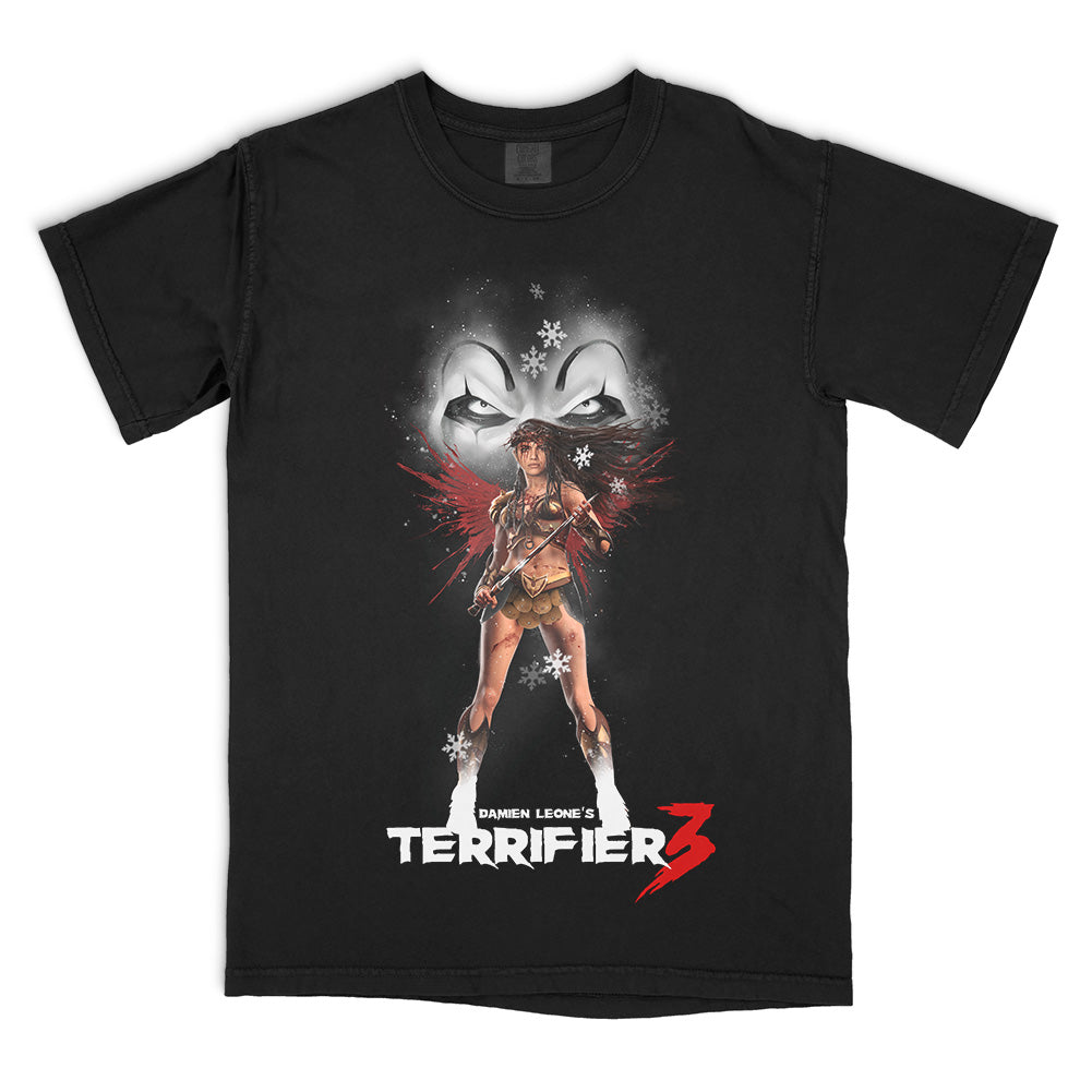 Terrifier 3 Stand Your Ground T-Shirt on a black Comfort Colors Tee featuring Sienna Shaw holding a sword beneath the sinister eyes of Art the Clown