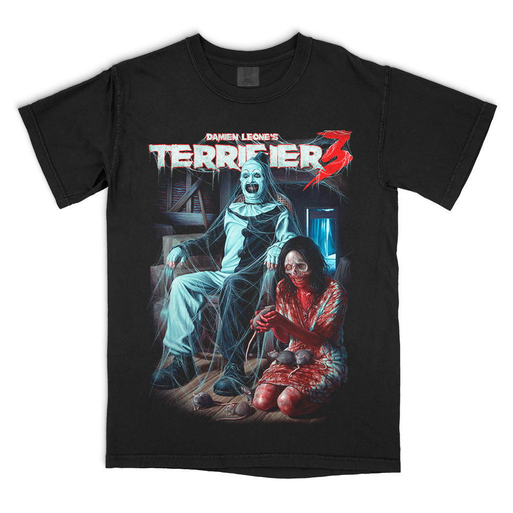 Black Comfort Colors Terrifier 3 Terrors in the Attic tee featuring Art the Clown, Victoria, cobwebs and rats beneath the movie logo.