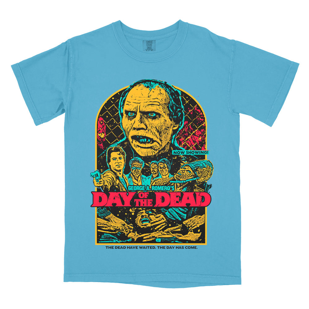 Day of the Dead The Dead Have Waited T-Shirt on a sapphire Comfort Colors Tee featuring Bub and characters from George A. Romero’s zombie classic in a colorful retro poster design