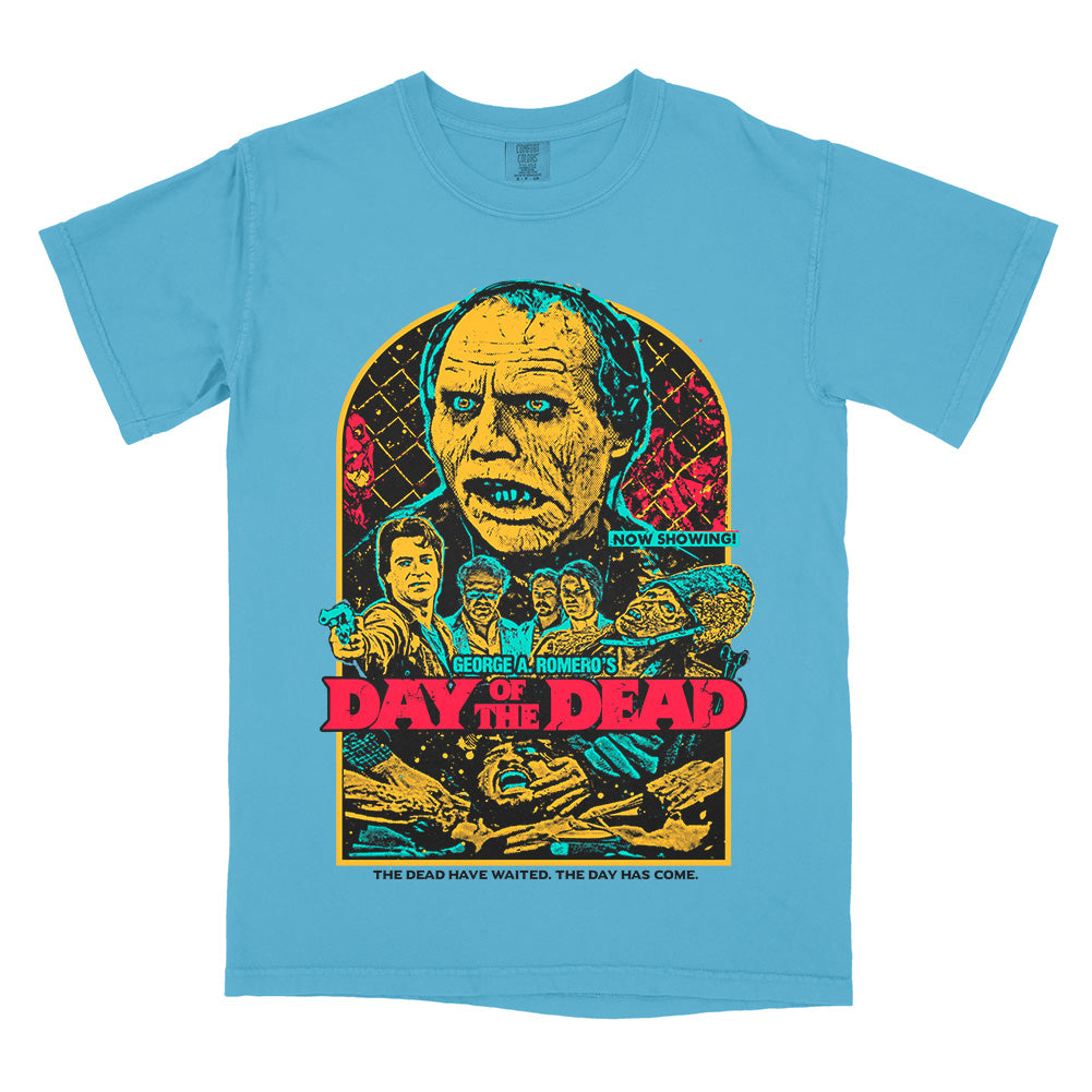 Day of the Dead The Dead Have Waited T-Shirt on a sapphire Comfort Colors Tee featuring Bub and characters from George A. Romero’s zombie classic in a colorful retro poster design