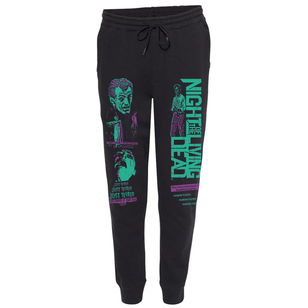 Officially licensed Night Of The Living Dead Unspeakably Terrifying black joggers featuring vintage horror movie artwork, distressed teal and purple graphics, and vertical Night Of The Living Dead lettering down the legs.